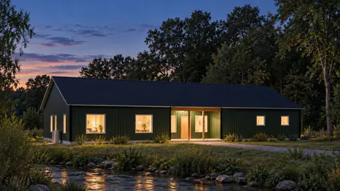Foxhollow 73 Garage, lights on, at dusk